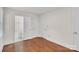Bedroom with hardwood flooring features multiple closets and an ensuite bathroom at 3733 Manchester Dr, Charlotte, NC 28217
