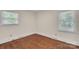Bedroom featuring bright windows and hardwood floors at 3733 Manchester Dr, Charlotte, NC 28217