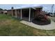 Covered patio with concrete flooring situated near a garden at 396 Pitts School Nw Rd, Concord, NC 28027