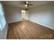 Spacious bedroom with wood floors, closet, and natural light at 396 Pitts School Nw Rd, Concord, NC 28027