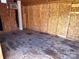 Interior of shed with plywood walls, electrical and AC unit at 396 Pitts School Nw Rd, Concord, NC 28027