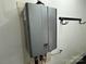A close up of a Rinnai tankless water heater at 396 Pitts School Nw Rd, Concord, NC 28027