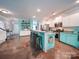 Stylish kitchen with granite countertops, stainless steel appliances, and a breakfast bar with seating at 4008 Houndscroft Rd, Indian Trail, NC 28079