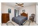 Comfortable bedroom with wooden furniture, including a bed with patterned bedding and a matching chair at 406 Brentwood Cir, Kannapolis, NC 28081