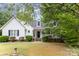 Charming two-story home with a landscaped front yard, covered porch and classic architectural details at 406 Brentwood Cir, Kannapolis, NC 28081