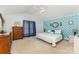 Bright main bedroom features vaulted ceilings, unique wallpaper, and stylish decor, with natural light at 406 Brentwood Cir, Kannapolis, NC 28081