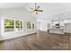 Bright living room with hardwood floors, large windows, high vaulted ceilings and open floor plan at 418 W Westview St, Gastonia, NC 28052