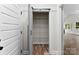 Walk-in pantry with adjustable shelving and brick flooring, offering ample storage space at 418 W Westview St, Gastonia, NC 28052
