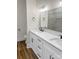 Well-lit bathroom features a double vanity with white cabinetry, quartz countertop, and modern fixtures at 420 Fulton Dr, Kings Mountain, NC 28086