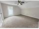 Empty bedroom featuring carpet floors, a ceiling fan, and a single window at 420 Fulton Dr, Kings Mountain, NC 28086