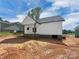 Exterior of home in construction phase, featuring white siding and a modern roofline at 420 Fulton Dr, Kings Mountain, NC 28086
