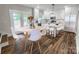 Bright kitchen featuring white cabinets, stainless steel appliances, and an island with seating at 420 Fulton Dr, Kings Mountain, NC 28086