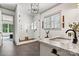 Bright bathroom featuring a walk-in shower, modern fixtures, neutral palette and granite counters at 4290 Palm Dr, Denver, NC 28037