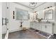Bright bathroom with double vanities, modern fixtures, neutral palette, and walk-in shower at 4290 Palm Dr, Denver, NC 28037