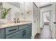 Modern bathroom showcasing a stylish vanity with granite countertop and neutral paint with updated fixtures at 4290 Palm Dr, Denver, NC 28037