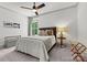 Cozy bedroom with a comfortable bed, carpet flooring, natural light, and contemporary decor at 4290 Palm Dr, Denver, NC 28037