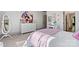 Bedroom with plush carpet, white walls and a large colorful equine painting above the white dresser at 4290 Palm Dr, Denver, NC 28037