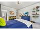 Inviting bedroom with ample storage, colorful decor, and a serene atmosphere at 4290 Palm Dr, Denver, NC 28037