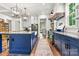Modern kitchen with custom blue cabinetry, stainless steel appliances, and hardwood floors at 4290 Palm Dr, Denver, NC 28037