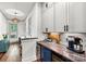 Stylish office nook with custom cabinetry, granite countertops, and a beverage center for added convenience at 4290 Palm Dr, Denver, NC 28037