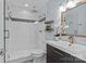 Bathroom featuring modern fixtures and a glass-enclosed shower at 430 Queens Rd # 111, Charlotte, NC 28207
