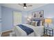 Bedroom with blue decor and natural light at 430 Queens Rd # 111, Charlotte, NC 28207