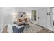 Cozy living room features stylish decor and a large window, creating an inviting and bright space at 430 Queens Rd # 111, Charlotte, NC 28207