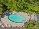 Aerial view of the private community pool with plenty of lounge chairs at 430 Queens Rd # 111, Charlotte, NC 28207