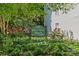 Community sign amidst lush landscaping and greenery at Myers Park Manor Condominiums at 430 Queens Rd # 111, Charlotte, NC 28207