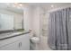 Full bathroom features granite countertops, tub with shower, and stylish shower curtain at 4312 Plumeria Way, Fort Mill, SC 29707