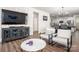 Spacious and bright living room flows seamlessly into the dining area, complete with stylish furniture and a modern design at 4312 Plumeria Way, Fort Mill, SC 29707