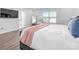 Bright and spacious main bedroom with a large bed, en-suite bathroom, and windows at 4312 Plumeria Way, Fort Mill, SC 29707