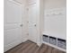 Mudroom with built-in bench, hooks, and storage cubes, offering organization and convenience at 4312 Plumeria Way, Fort Mill, SC 29707