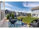Cozy backyard patio with four chairs and a blue outdoor rug in a townhome community at 4312 Plumeria Way, Fort Mill, SC 29707