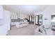 Contemporary kitchen with island seating, pendant lights, and stainless steel appliances at 4609 Firethorn Ct, Denver, NC 28037