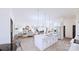 Bright, open living space blending modern design with hardwood floors and stainless steel appliances at 4609 Firethorn Ct, Denver, NC 28037