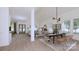 Open concept home interior showcasing hardwood flooring and lots of natural light at 4609 Firethorn Ct, Denver, NC 28037