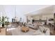 Bright open-concept living area with dining room and kitchen, perfect for entertaining at 4609 Firethorn Ct, Denver, NC 28037