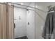 Modern bathroom with a tiled shower, updated fixtures, and a shower curtain at 4927 Gateway Dr, Claremont, NC 28610