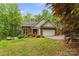 Well-maintained brick home with manicured landscaping and an attached two-car garage at 4927 Gateway Dr, Claremont, NC 28610