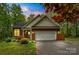 Charming brick home with landscaped front yard and attached two-car garage, perfect for suburban living at 4927 Gateway Dr, Claremont, NC 28610