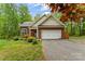 Attractive brick home with an attached garage, driveway, and well-kept front lawn at 4927 Gateway Dr, Claremont, NC 28610