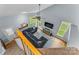 Bright living room with vaulted ceilings, a large sectional sofa, and ample natural light from large windows at 4927 Gateway Dr, Claremont, NC 28610