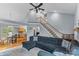 Spacious living room with hardwood floors, connected to kitchen and dining area, great for entertaining at 4927 Gateway Dr, Claremont, NC 28610