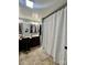Bathroom features a vanity, mirror and tiled floors at 548 Alspaugh Dam Rd, Taylorsville, NC 28681