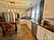 A bright updated kitchen features new appliances, updated countertops, and ample storage at 548 Alspaugh Dam Rd, Taylorsville, NC 28681