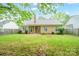 Lush backyard featuring a patio for outdoor entertainment at 6007 Kenmore Ln, Indian Trail, NC 28079