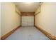 A functional garage provides secure parking and storage at 6007 Kenmore Ln, Indian Trail, NC 28079