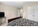 Bedroom showcasing a TV, double closet, overhead light, and neutral walls at 6041 Laurent Ave, Fort Mill, SC 29715