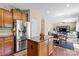 This kitchen features granite countertops, stainless steel appliances and a central island at 6041 Laurent Ave, Fort Mill, SC 29715